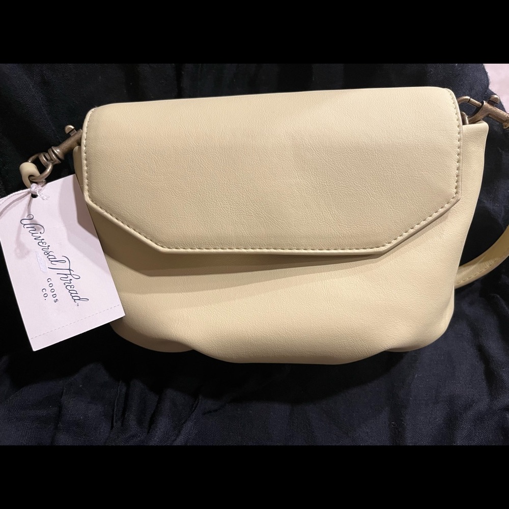 Universal thread yellow purse